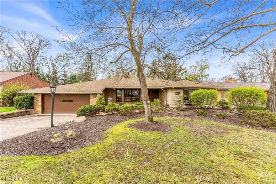 Sprawling Brick Ranch in Prime Location Near Elmwood Park!
Welcome to this spacious 3-bedroom brick ranch situated in a highly desirable neighborhood near Elmwood Park, schools, and the Civic Center. Perfect for entertaining, this home features a 23' x 19' family room complete with a cozy fireplace and wet bar, all overlooking a serene wooded backyard oasis with an in-ground pool, pool house, and stamped concrete patio and walkway.
The eat-in kitchen offers a newer refrigerator, pantry, and access to a raised deck—ideal for morning coffee or summer dining. Just off the foyer, you'll find a welcoming living room & dining room with carpet/hardwood floor and a stone fireplace, complemented by views of the front porch.
All three bedrooms feature hardwood flooring and ceiling fans. The primary bedroom includes crown molding, a bay window, and a convenient ensuite half bath.
The finished lower level expands your living space with a large recreation room, retro 60s-style wet bar, another fireplace, a full bath with a shower, a laundry room (with washer, dryer, and utility sink), a workshop/storage area, and a convenient walk-out to the backyard and pool.
Additional highlights include a newer roof with leaf guards and glass block windows. Enjoy close proximity to city amenities and effortless access to major highways for an easy commute to Cleveland, Akron, or the airport.
This home has great bones and is full of potential—ready for you to move in and make it your own!