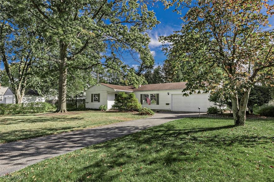 3 bedroom, 1.5 bath ranch in prime Lyndhurst location! Light & Bright living room flows into dining room. Carpet in all rooms (except kitchen) was installed in 2025. Laminate flooring in kitchen & hallways. Ceramic tile flooring in full bath and half bath was installed in 2024. Rooms were painted recently. Glass block window in shower area of bathroom affords lots of light.  Enclosed back porch; back patio. Parklike setting in private backyard. Enjoy morning sunshine on front porch and patio. Paver pathways and patios. Split rail fence; leafguard gutters. Drains were installed in backyard. Walk to Acacia Metropark. Optional membership available for private Meadow Wood Park, including wooded walking trail and pathways, pool, tennis courts and picnic pavilion. Convenient to shopping, main roads and freeway. Easy drive to enjoy University Circle Cultural Hub.