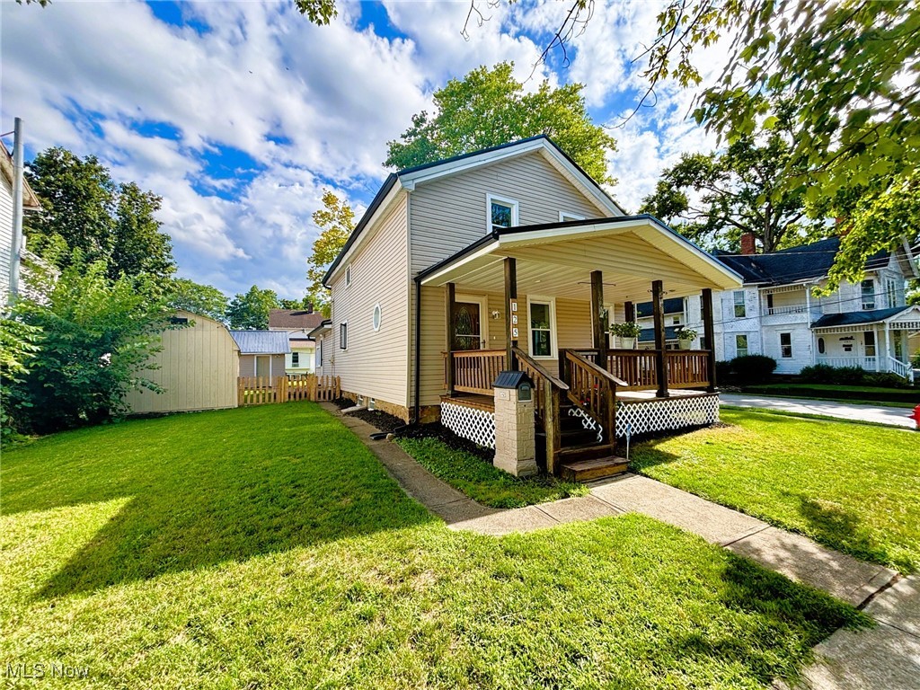 Welcome to this Gorgeous Updated 3 bedroom Century home in the Heart of Downtown Village of Lodi! Thousands of dollars have been put into this lovely home to include: Newly installed 7/25: Home & Garage Full Metal Roof Replacement, Sleek Seamless gutters on the home. 8/25: Glass block vented windows. Hot Water Tank, Master Bedroom carpeting, both walk-in closets & Hallway. Lighting in Master Bedrm, closet, 2nd Bedrm ceiling fan/light w/ remote control & closet light. Bath flooring, medicine cabinet/lighting, shelving. Laundry/Entryway Room Luxury Vinyl. Fireplace Heater Insert “Fire and Ice” w/remote control. Baseboards, Crown moulding, Newly Installed Privacy Fence & more! The kitchen has been thoughtfully renovated & includes microwave & refrigerator—perfect for both everyday living & entertaining. Massive (15 x 12) dining rm w/ crown moulding & gorgeous fireplace. Enjoy the (17 x 14) living rm with a ton of natural lighting & Oak Staircase leading upstairs. Just off the back of the home, you’ll find a detached 2-car garage & oversized shed, offering plenty of storage, overlooking a fully fenced backyard—ideal for children or pets. Renovated 1st floor bedrm feat a nice size closet w/ built-ins & newer solid oak door. Spacious laundry/bonus rm (16 x 9) has newly installed flooring & enough space to add a 1st floor Full Bath complete w/ pantry. Upper level boasts 2 nice size bedrms w/ walk-in closets. One of the Master closets offers great flexibility having a window and can be used as an: office, nursery or more. Don't miss your chance to make this beautifully updated home your own—schedule a showing today! Walk to restaurants, Cleveland Clinic, Stores, Post Office, Bank, Park/Playground, Museum. Close proximity to grocery store, schools, new community splash pad, library, rec center, I-71 & All major highways! One yr Home Warranty Included! Owner is a licensed agent in the state of Ohio. Listing Agent is related to the Seller.