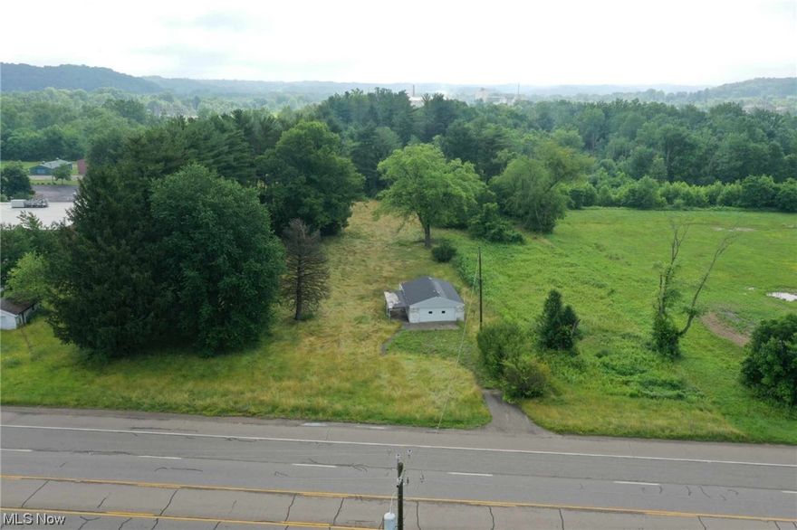 Great Commercial Location with convenience to I 70 and within minutes to the 70/77 Interchange. The high visibility and a traffic count of 23,000 on any given day this property is ideal for development located in the heart of Southgate Parkway across from the Walmart Plaza. Adjacent property is also available for purchase.
