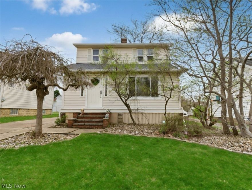 Welcome home to this charming 1925 Colonial nestled in the heart of Lyndhurst! Full of character and warmth, this 3-bedroom, 1.5-bath home beautifully blends timeless charm with major updates and an unbeatable location. A bright and inviting living room features a cozy fireplace—perfect for relaxing evenings—and flows effortlessly into a spacious dining room ideal for entertaining. The kitchen is full of personality, showcasing unique green cabinetry, a stylish tan checker backsplash, ample counter space, and a charming island that makes both cooking and gathering a joy. An additional bonus area provides extra storage or prep space, while sliding doors lead out to a deck and backyard—perfect for summer nights or morning coffee. Enjoy newer flooring throughout the kitchen, dining room, and side entryway, adding a fresh, modern touch. Upstairs, you’ll find three comfortable bedrooms and a full bath with a functional and inviting layout. The finished side of the lower level expands your living space with a fun bar area and classic knotty pine walls, ideal for entertaining or unwinding, while the basement also includes a half bath and dedicated laundry area. Major mechanical updates provide peace of mind, including a new roof and gutters (2025), HVAC system (2023), and hot water tank (2022), big-ticket items already taken care of! Located just minutes from shopping and dining at Legacy Village, outdoor recreation at Acacia Reservation, major freeways, hospitals, and a community pool, this home offers the perfect blend of convenience and lifestyle. Don’t miss your chance to own a truly special home full of charm, personality, and smart updates—schedule your private showing today!