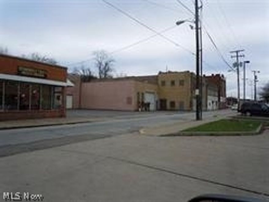 Large commercial building with access for larger trucks, plenty of warehouse space, large parking area. Includes a retail area separate from the warehouse area. In addition, two apartments above the office area. Many potential uses. All offers must be approved by the court.