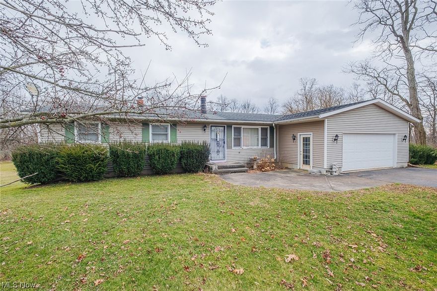 Welcome to your dream home nestled on 2.5 ACRES of beautiful, sprawling landscape! This property has the perfect blend of comfort, convenience, and tranquility. Step inside to discover a charming layout featuring three Bedrooms, EAT-IN Kitchen, Dining Room, Living Room, Family Room and FIRST-FLOOR Laundry Room, which adds an extra layer of convenience. 
Indulge in the beauty of natural light streaming into the SUNROOM, enjoying your morning coffee in this sunlit space is sure to become a favorite spot in the home. Continue outside to the back PORCH, where you can unwind and soak in the serene views of the surrounding landscape. Spend an evening on the side DECK hosting a BBQ and watching the sunset. Imagine evenings spent gathered around a fire pit under the stars. Descend to the partially FINISHED WALK-OUT Basement, a versatile space that offers endless possibilities. Transform it into a cozy Rec/Living room, a home office, or even a fitness area – the choice is yours. With direct access to the PATIO and the expansive backyard, you can seamlessly transition indoor activities to outdoor adventures. Embrace the opportunity to make this home truly your own, as it is being offered "as is" and ready for your personal design touches. With well-maintained features, this property provides the perfect canvas for your creative vision. Located close to SR 224 and minutes from I-71, with quick access to Medina, Wooster, Wadsworth and Ashland and Cloverleaf School District. Room sizes are approximate. This home offers the perfect balance of serenity and convenience. Don't miss your chance to make this exceptional property your own – schedule a showing today and experience the lifestyle you've been dreaming of!