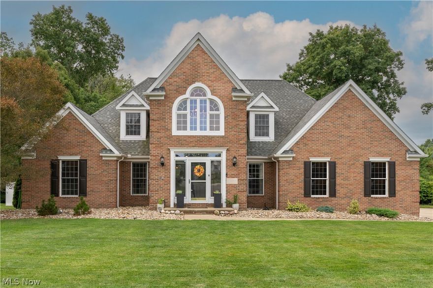 This custom built quality home offers an appealing open floor plan, in Lake Schools with all the space you want.  This breathtaking home will impress you from the moment you step into the stunning 2 story great room with 2 way 2 story fireplace.  Custom designed sunroom full of windows, circular Cathedral ceiling will become your retreat with its scenic backyard view.  Quality apparent throughout with the dental tooth finishes in the crown molding, solid wood doors, windows trims. TWO first floor master suites: both Master suites have private full bath & abundant closet space: great in-law suite.  Kitchen has double ovens, stainless steel appliances & center island with breakfast bar... open & inviting for everyday life or entertaining! 1st floor Office with built in cabinets & desk.  Second floor features 3 additional bedrooms, one is a JR suite with full bath, walk in closet & the "Secret Room" sure to excite the young ones.  2nd full bath on this level too.   3 car side load garage.