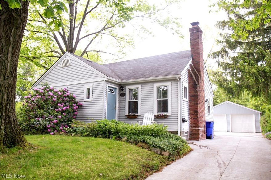 CHARMING 3 BEDROOM/1 BATH CAPE COD LOCATED ON CORNER LOT WITH FENCED BACK YARD AND 2 CAR GARAGE.  KITCHEN WITH NEWER CERAMIC FLOORING OPENS TO DINING & LIVING RM WITH WOOD FLOORS.  LIVING AREA OFFERS FIREPLACE.  1ST FLOOR ALSO HAS 2 BEDROOMS AND FULL BATH.  3RD BEDRM IS LOCATED ON UPPER LEVEL.  HOME WARRANTY PROVIDED!  NEW  ROOF 2011, FURNACE & AIR 2016,  HOT WATER TANK 2015,