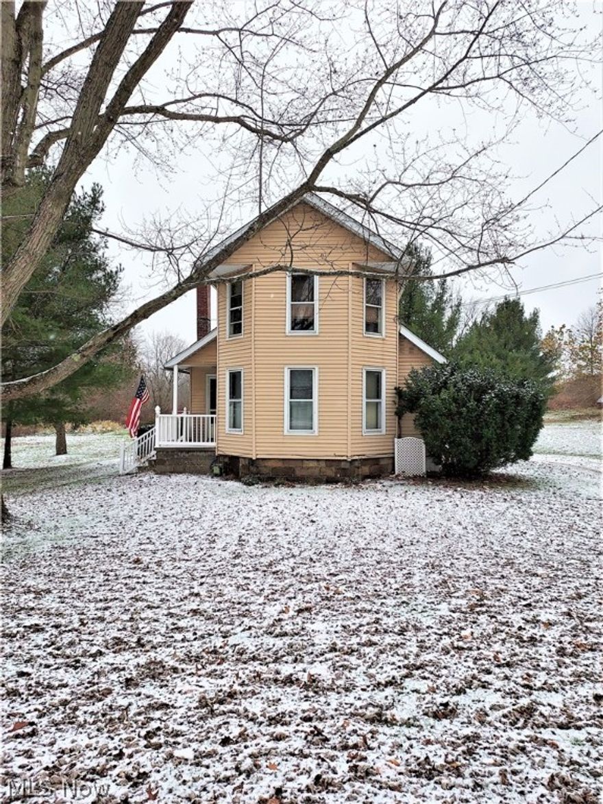 Take a look at this charming converted home.  The first floor has 2 bedrooms, living room, full bath and spacious kitchen.  The master bedroom is spacious.  This unit also has access to the basement, for storage and laundry hook-up.  The 1 bedroom second floor unit has charm and nice space, sunken bedroom, walk in closet and spacious living room.  There is a 2 care garage for storage or covered parking.  Electric is separate, water and gas are not.  This is a great way to offset living expenses, occupy 1 unit and rent the other.  Each unit has a separate entrance.  This home is being sold As Is. See supplements for additional information.