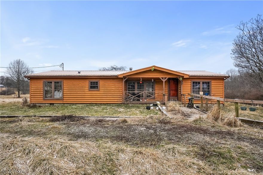 66887 & 66879 Wintergreen Rd, Lore City, Ohio 43755 is over 15 acres of beautiful land with a manufactured home on a permanent foundation including 3 bedrooms, 2 full bathrooms, Eat-in kitchen, large living room, laundry room in an area tucked away in Guernsey County with State Of Ohio Natural Resources hundreds of acres surrounding the area as well as Salt Fork Lake Park is an easy drive. The home has wood log siding, circular driveway, 2 parcels, covered porch, 2 outbuildings / sheds, and so much more to offer with a second buildable parcel or keep as homestead. There is an ELECTRONIC PRIVACY GATE so do NOT walk this land without an appointment with permission. A code word will be required and you'll be let in by the camera at your appointment time. This is an Estate Sale therefore Subject to Court Approval. Cash, Conventional and in a USDA area. The Manufactured Home needs cleaned up and some deferred maintenance. As a Court Ordered Sale, there will be NO Seller repairs, Owner is deceased and an assigned Administrator will sign paperwork then it will be presented the court for a judge to sign the acceptable offer. Tucked in near Salt Fork with nearby access to I-70 & I-77 with Wintergreen also being 285 at Old Washington off of I-70 and off of 22 on I-77 to 40 in Cambridge OH.