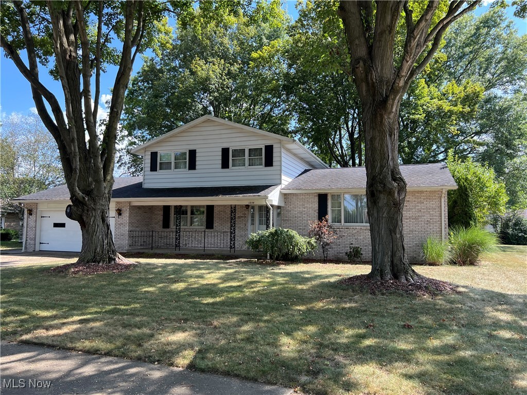 Lovely tree lined street with nice back yard. Large 2 story home with access to community pool, association fee required only if you join. Spacious rooms and partially finished lower level. This home is well cared for and has plenty of living areas. Walkable neighborhood close to schools and mall. House is 2,392 sq ft built in 1967.