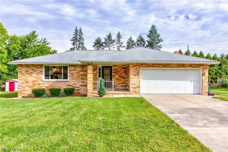 Situated on one third acre in North Royalton, this 3 bedroom, 1.5 bathroom brick ranch has great space indoors and out! The kitchen has new flooring, bright recessed lighting, a tile backsplash, and space for a dinette table. A large family room with new flooring has a wood burning fireplace perfect for chilly nights. Refinished wood flooring flows through the formal dining room, living room and bedrooms. Bedrooms are a great size and have nice closet space. The main bathroom was remodelled with a stylish vanity, new fixtures and 5 foot stand up shower with glass doors. You don’t have to go up and down stairs to do laundry, an additional first floor laundry room adds convenience and there is a secondary laundry location in the basement with a utility sink. At 1855 square feet, this home has an unfinished basement perfect for storage and unlimited possibilities to create an awesome recreation area. Outdoors, there is a beautiful stamped concrete patio with plenty of space for entertaini
