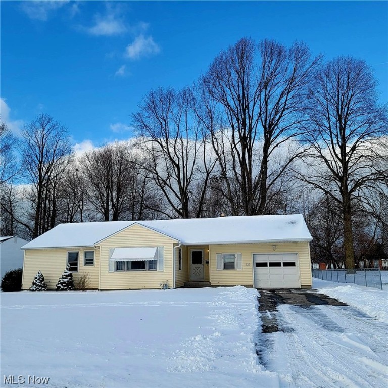 Welcome home to this charming, one-story ranch in Mentor! Walking distance to restaurants, stores, parks etc. Hardwood floors throughout with plenty of space for entertaining. The third bedroom was being used as an office. A partition can easily be added to restore back and offer privacy. The four seasons room is heated and overlooking the large, private, fenced in backyard. Great turn key investment or blank slate to turn into your own home sweet home.