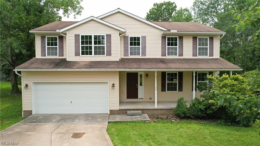 Spacious 4 bedroom colonial with open concept kitchen (with ample counter and cabinet space), large living room and eating area that has sliders that lead to you outside to your .551 acre lot. Your laundry room, dining room and half bath finish off your first floor. The second floor boasts your 4 large bedrooms and 2 full baths! The master bedroom has your master bath with walk in closet and 3 additional bedrooms and an additional generous full bath. The basement is 968 sq ft of blank canvas and ready for finishing. Everything that you need is here with this home including your 2 car attached garage and concrete driveway. This home is conveniently located in Streetsboro with easy access to both Akron and Cleveland, area shopping and more! Home needs some TLC, cosmetic repairs and touch ups.