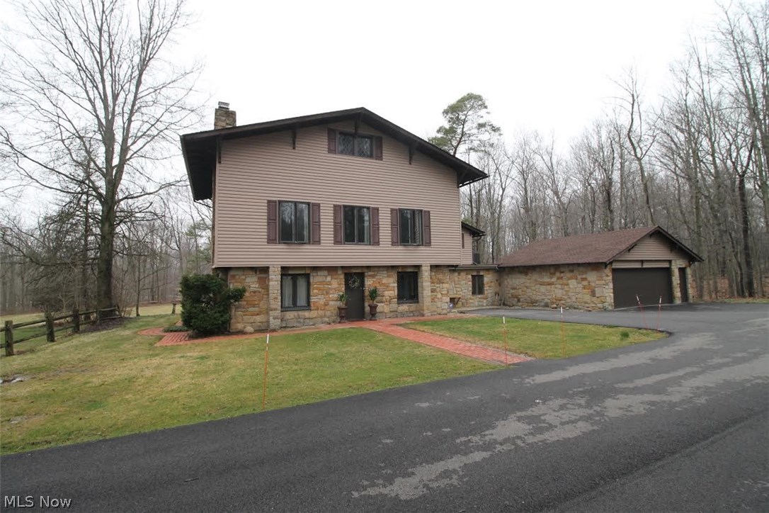 7 + ACRES!! Unique majestic home with close proximity to major highways. This very spacious four bedroom, two full and two half bath home located on 3.61 acres with an additional 3.57 acres on adjoining parcel! Kitchen just remodeled in 2014 with updated countertops, sink and faucet. There is ample cabinet and counter space, built in microwave, double wall gas oven and a gas cooktop. Fresh paint throughout the home along with replaced lighting, fans, carpet, hot water tank, electric panel, GFI'S, beautiful landscaping, and outdoor balcony. Amazing third floor remodel includes attractive flooring and updated bathroom, all completed in 2015. Repaved asphalt driveway installed in 2014. Recent first floor remodeling including the first floor den, and spacious bonus room; also included in first floor is a large laundry room with newer utility sink. First & 2nd floor Fireplaces. Garage roof was replaced in 2008. A professional home inspection has been recently performed. A two and a half car