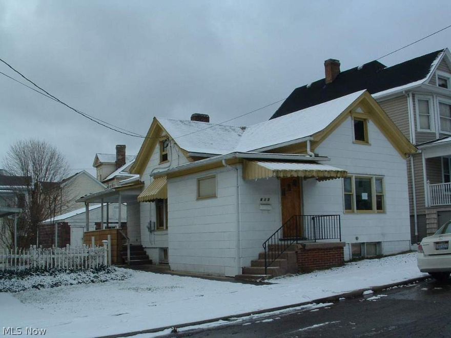 Two bedroom ranch style home on level lot with detached garage. Walking distance to local amenities.