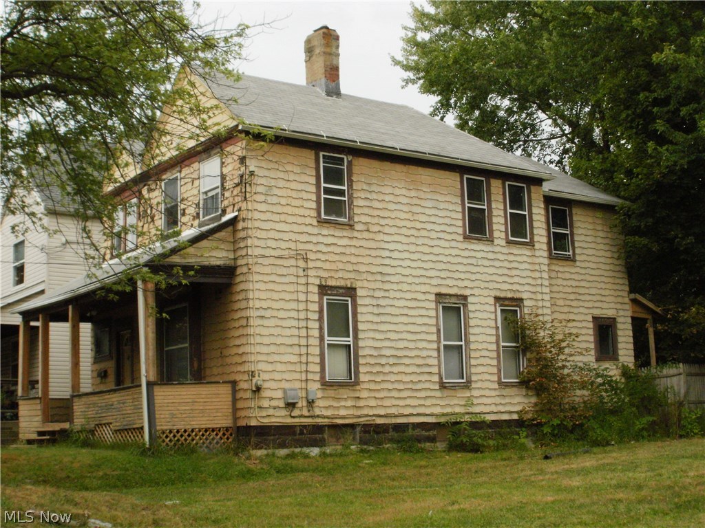 Spacious converted 2 unit features 3 bedrooms, living room and kitchen in upstairs unit. Downstairs unit with 2 bedrooms, kitchen and living room. 2 full baths. Units were rented for $700 each. Seller paid utilities. Furnace 2004. Hot water tank 3 years. Some newer windows.