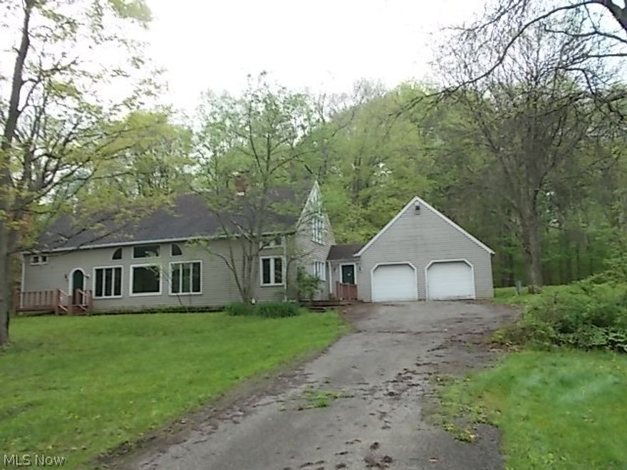 Spacious home to a picturesque retreat situated on 5 acres of wooded property. This very unique timber-framed home has a First floor master bedroom and bathroom. Spacious open floor plan with floor to ceiling windows overlooking spectacular views. Two story great room features a brick wood burning fireplace. Great home for entertaining. Don't miss out! Owner Occ. Buyers & Agents must sign OwnerOccupant Certificate found in MLS Attachment in order to make offer.  This is a Fannie Mae HomePath property. Purchase this property for as little as 5% down!