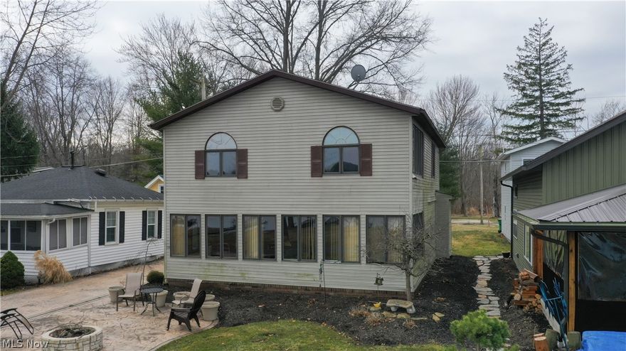 Have you been on the hunt for the perfect lakefront spot? Well, look no further! This gem sits on one of the BEST spots on Luna Lake. Overlooking one of the best fishing lakes in the county, this home is sure to please! Make your way up to this beauty and you come to the massive front concrete patio with panoramic views of the lake complete with its own stone fire pit. This will be THE spot to be this Summer. Heading inside you are greeted by the open concept living area with all glass windows that allow for a ton of natural light and of course a breathtaking view of the lake. Just off of the living area is the large dining room which would be great for entertaining family or friends. Continuing on into the kitchen prepare to be amazed as this home offers a ton of cabinet space, stainless steel appliances and SO much more. This property also has a first floor bedroom, a full bathroom, first floor laundry and a TON of storage space. Making your way upstairs you come to three generously