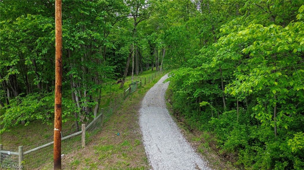 Photo of 5309 Cherry Run Rd Road, Strasburg, OH 44680 (MLS # 5212786)