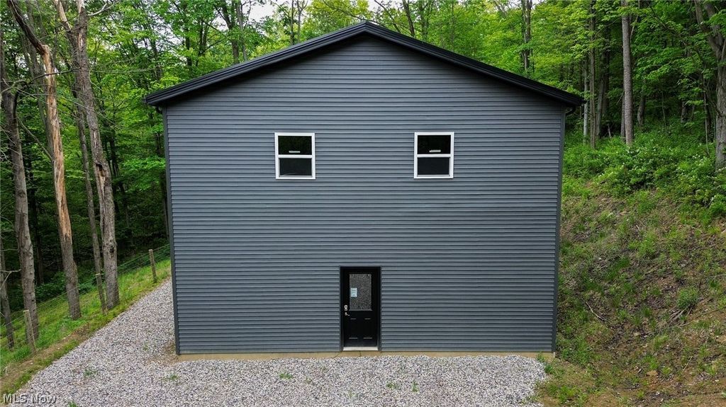 Photo of 5309 Cherry Run Rd Road, Strasburg, OH 44680 (MLS # 5212786)