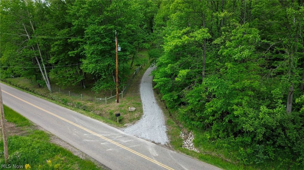 Photo of 5309 Cherry Run Rd Road, Strasburg, OH 44680 (MLS # 5212786)