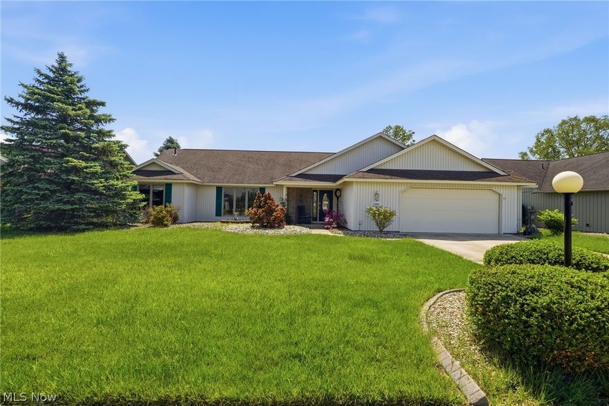 Thoughtfully designed one-level slab ranch that lives large and feels instantly welcoming. Enter into a foyer that opens to a spacious great rm anchored by a brick-front, wood-burning fireplace for cooler nights. Huge eat-in kitchen with island, pantry & ample cupboard space offers a clear view into the great rm—ideal for everyday living & entertaining. Bright morning rm overlooks a lush, grassy common area. Sliding doors lead to the back patio with pergola (2015)—a cozy outdoor retreat for relaxing, dining or enjoying the peaceful, open green space. Pocket doors open from the great rm into an impressively large formal dining rm. The private primary suite features its own bath with shower, separate jetted tub, dual vanity & walk-in closet. Two additional bedrooms & a full bath on the opposite side provide flexibility for guests, family or home office. Handicap-accessible features add ease & versatility. Spacious laundry rm off the oversized 2-car garage with pull-down attic & updated springs (2018). Updates include: microwave (2022), stove & dishwasher (2021), disposal (2025) & outdoor lighting (2024). Roof & mechanicals are original, reflecting long-term ownership and care. While the décor may be ready for your personal touch, the floor plan & features are exceptional. Enjoy community amenities including clubhouse, Olympic-length pool, fitness facilities, sidewalks & social activities. Conveniently located near I-480, shopping & dining. This home blends an exceptional floor plan, one-level living & neighborhood amenities—ready for your updates, your style & your next chapter.