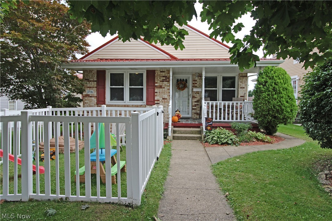 This stunning 3 bedroom, 2 1/2 bath home has many updates and is way bigger than it looks. Beautiful updated kitchen with tons of natural light, newer furnace and central air, roof, windows, and much more! Huge finished lower level with gas fireplace and mudroom, sliding glass doors lead to covered patio, 2 car garage. Lower level room currently used as an office but could also be a 4th bedroom. Move right in!