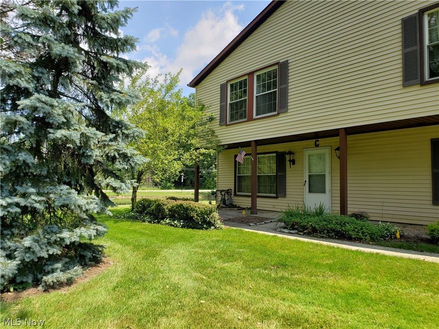 Live like you're on vacation! 3 bdrm, 1.5 bath condo against the woods next to fishing pond. Water & Sewer are included in condo fee! L-shaped living/dining room opens to kitchen with breakfast bar. All appliances stay. New windows 2009 (except 2 small bdrms). New dishwasher 2018. Stackable washer/dryer. New wood plank laminate floors on first floor 2019. Newly renovated half bath 2017 (new toilet, vanity, sink, faucet & lighting). 305 acre lake for swimming, fishing, boating, & waterskiing. 2 soft sand beaches, 2 in-ground pools, 2 playground facilities, 4 tennis courts, basketball courts, baseball diamond, volleyball courts, marina, party center, swim team, & lots of planned neighborhood parties & events throughout the year. Dock space only $200 per year!