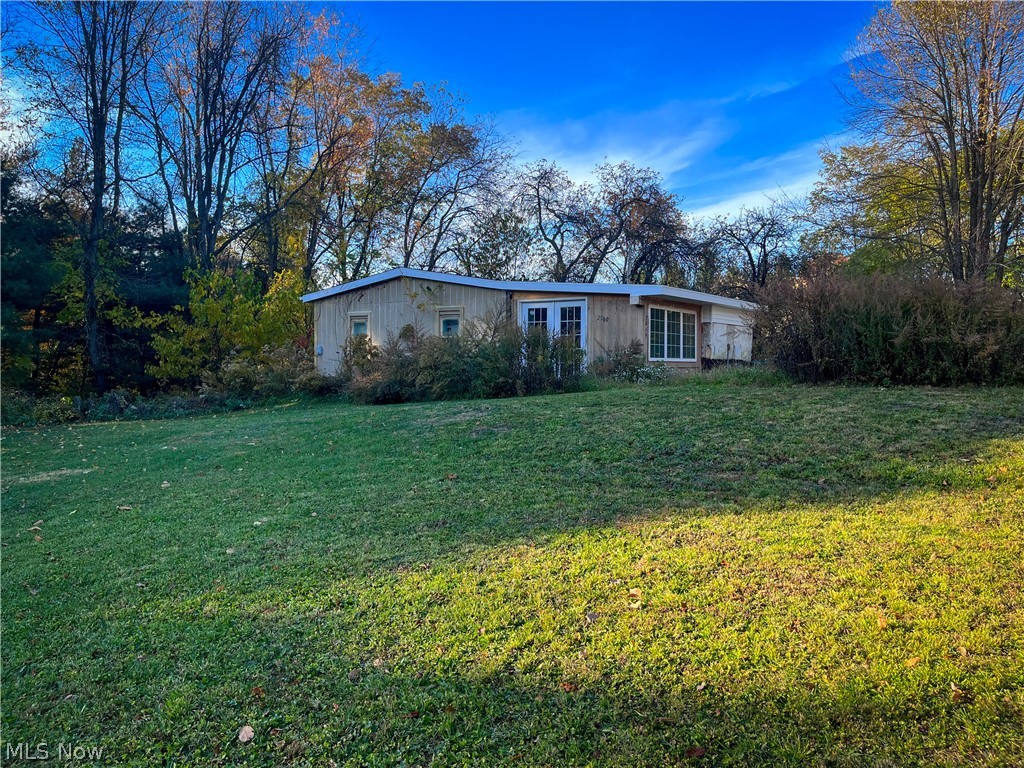 2069 Martin Rd --- 1 bed/1 bath ranch in Suffield Township situated on .73 acres. Fixer upper, but lots of potential for the property and the land. Partial new roof. CASH ONLY.