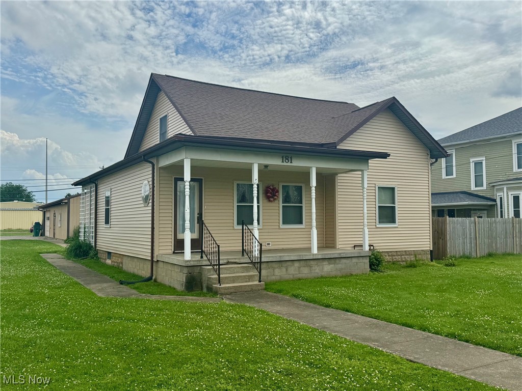 Charming home on with a wonderful yard located in the Village of Frazeysburg. Home has tons of potential with extra large kitchen and bath, and additional room on the 1st floor that could be 4th bedroom with a little work. OVERSIZED DETACHED GARAGE with workshop is over 1500 Sq. Ft and includes 220 electric, heat, and 1/2 bath! New breaker box entrance cable in 2024, new roof on garage in 2024, new siding on house in 2024. Columbia gas budget of $128/month, AEP $115/month, Frazeysburg Water & Sewer.