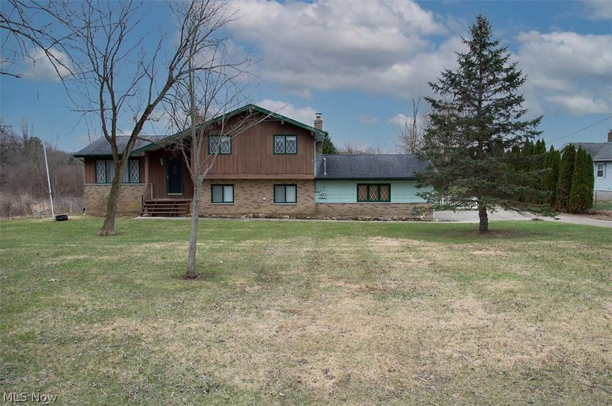 Absolutely Adorable 3 Bedroom Split Level Home with 2 Full Bathrooms and an Amazingly Scenic, Private Backyard with oversized barn with a concrete floor. Home Features Include: Large Front Living Room, Awesome Updated Kitchen that has been freshly painted, Spacious Cabinets, & Flooring that leads out to large deck. Ginormous Formal Dining Room overlooking the lower-level Family Room. Second Floor offers 3 Large Bedrooms & Full Bath. Lower Level features a Family Room Area and additional full bathroom. There is also a large full basement. Well and Septic has already passed inspections from county. This home is being Sold as is and is now ready for a set of new homeowners. Call and Schedule your Showing Today!