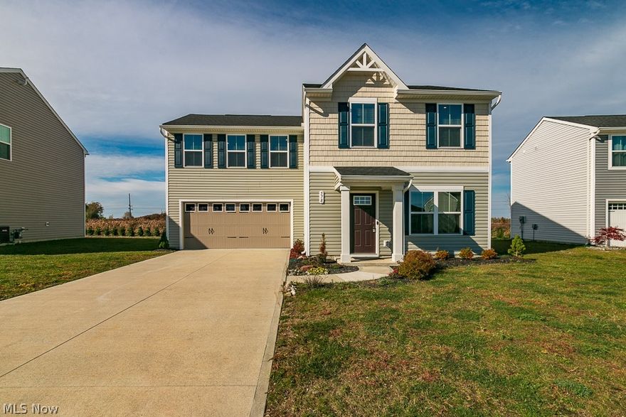 Welcome to this newer colonial built in 2021, ideally located in desirable Painesville Township and within the sought-after Riverside Local School District, offering modern design, thoughtful upgrades, and exceptional functionality throughout. This beautifully maintained four bedroom, three bathroom Birch model showcases an inviting open concept layout perfectly suited for both everyday living and entertaining. The spacious living room flows seamlessly into the stunning eat-in kitchen, creating a bright and cohesive main living area enhanced by durable and stylish LVT plank flooring that extends throughout the entire first floor and all bathrooms. The kitchen is a true centerpiece, featuring a large center island with granite countertops, abundant cabinetry, and ample space for dining, with a rear door that opens to the backyard overlooking a peaceful waterway, providing a scenic and private backdrop. The home is equipped with modern conveniences including a Nest thermostat, ensuring comfort and efficiency year-round. Upstairs, the expansive owner’s suite offers a relaxing retreat with a walk-in closet and a private full bathroom, while three additional bedrooms provide generous space, with three of the four bedrooms featuring walk-in closets. A second full bathroom and a highly convenient second floor laundry room located near the bedrooms add to the home’s practicality. A well-placed half bath on the main level enhances functionality for guests. The attached two car garage completes the home’s impressive layout. With its contemporary layout, beautiful setting, and prime location within a sought-after neighborhood, this exceptional property presents a rare opportunity to enjoy modern living at its finest.