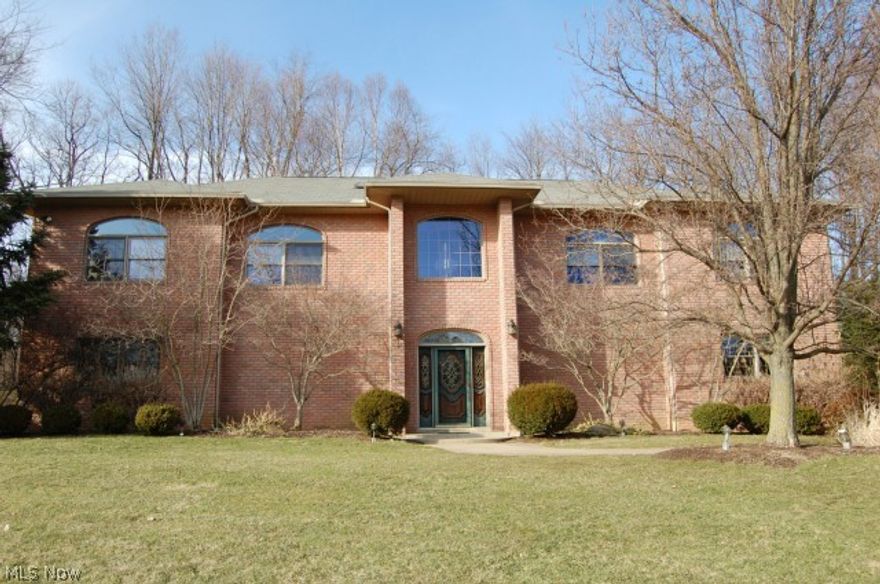 Impeccable Custom built, one owner, all brick 2-story. Home is set back 750 ft off road and provides a sense of peace and privacy. 3BR/3.5BA and 5162 sq ft of living space.  The master offers an extra large walk-in closet, sliding doors to back deck, en suite master bath with Jacuzzi, glass shower and dual sinks.  The great room has cathedral ceilings and is open to kitchen, first level and back deck.  The kitchen offers ample storage and is perfect for entertaining.  Geothermal heat, 2nd level freshly painted and carpeted within the last year.  The 1st level family room has a full wet bar and additional full bath.  The side entry 3-car garage is heated and has an attached workroom (other room) with large workbench and storage.  3.13 acres of land.  Don't miss out!