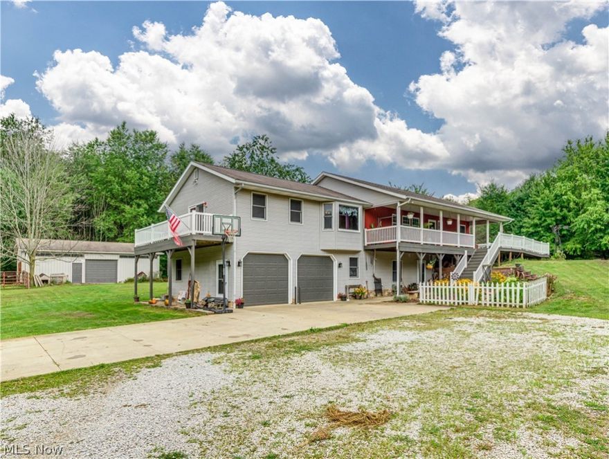 Talk about room to grow in Medina! Beautifully landscaped colonial on just a little over 6 acres! The covered front porch is so inviting for the fall weather coming. As soon as you enter your new home it has an opening to the lower level, or the hallway leads you to your open concept living room and kitchen. The high ceilings and lots of windows make it so bright indoors. The kitchen has so an island for extra seating and storage. Great to make the gatherings flow into the living room. Tile backsplash over the sink with built in shelving for your fancy plates, room to decorate the top of the cabinetry and so much counterspace with recessed lighting. The dining room area has more cabinets and a small counter space. Barn doors lead to what could be used as a family room open to the deck. Master Suite has barn door to enter and an on-suite bath with standup shower. Another nice size bedroom, full bath, and 1st floor laundry on the first floor. 2 more bedrooms, full bath, and another laund