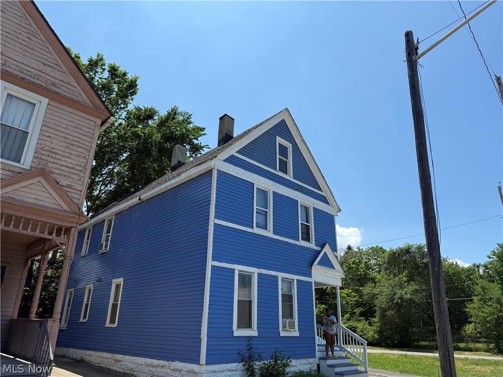 Photo of 7108 Dellenbaugh Avenue, Cleveland, OH 44103 (MLS # 5219961)