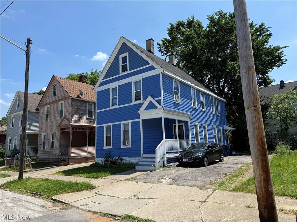 Photo of 7108 Dellenbaugh Avenue, Cleveland, OH 44103 (MLS # 5219961)