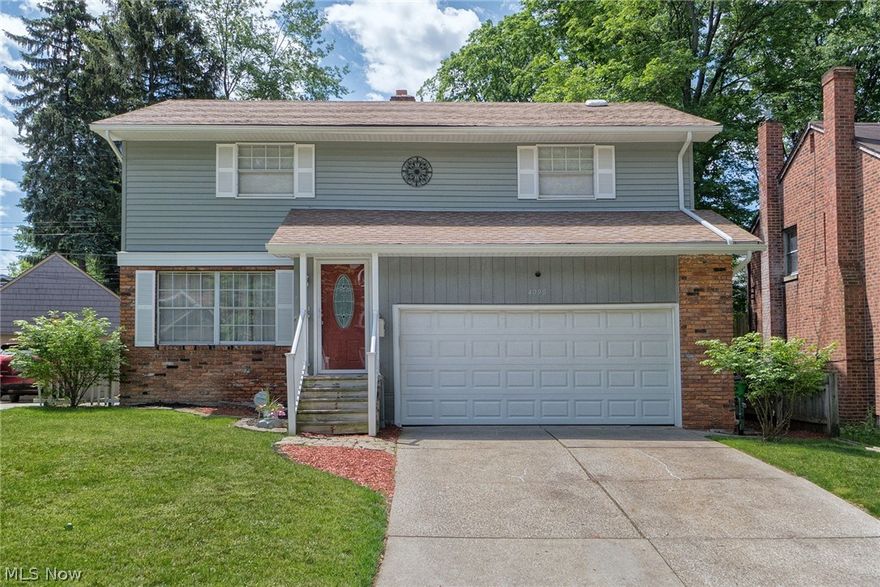 Welcome home to this beautifully updated Colonial where Pride of Ownership shows throughout. This home features over 2000 sq. ft. of living space starting with a big Living Rm, carpeted, that showcases a gas Fireplace w/ceramic hearth. Enter into the Dining Rm that features a gorgeous hardwood floor. Enter into extremely large eat in Kitchen w/SS appls., double SS sink & ceramic counter tops, tons of cabinet space including a pantry and corner hutch. A slider leads to your deck. A half bath conveniently located on 1st floor, recently updated, and entry to the 2+ car garage w/elec & center drain. Upstairs are 2 large bdrms with laminate flooring and an Owners Suite that has been made into one huge (was 2 bdrms made into one) suite with double closets, gorgeous hardwood floor, and an updated master bath featuring large shower. Another full bath and linen closets complete the 2nd floor. On the lower level is a finished family room for more living space and a large area for laundry and sto