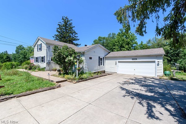 This Century Old, 3 Bedroom 2 Full Bath home is truly unique with the original building dating back to 1850. Three large areas, dining room/living room with a gas fireplace, a family room with built-in closet space, and a large downstairs family room with built-in shelving and spacious windows overlooking the garden and trees. The kitchen was completely remodeled in 2019 and includes granite countertops, tile backsplash, floating shelves, and all new appliances. The master bathroom was completely remodeled in 2020 including adding a window and a marble walk-in style shower. The first floor bathroom has was partially remodeled in 2018 to install a new bathtub and shower tiling. The yard is a gardener’s paradise. The lot is nearly an acre and includes berms to shield the yard from the road and provide a private yard with a pond. The pond is home to schools of koi fish, frogs, ducks, and geese. The back deck provides a beautiful spot to host friends and family and grill while lookin