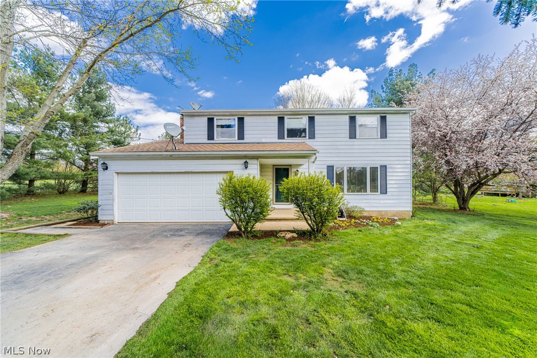 Welcome to this stunning home nestled in picturesque Bainbridge Township, situated on a generous 1.6-acre lot offering both space and serenity. This home (with only the 2nd owners) boasts 4 spacious bedrooms and renovated 2.5 bathrooms, (the 2 full bathrooms have heated floors), comfortably accommodating families of all sizes with room to grow. The kitchen includes granite countertops, custom-made, Kraftmaid cabinets and ceramic tile flooring, ideal for the avid cook or those who love to entertain. Dishwasher, disposal and stove hood will remain. On chilly nights, cozy up by the wood-burning fireplace, creating a warm and inviting atmosphere throughout the home. The large master bathroom serves as a private oasis where you can unwind and relax after a long day. With many recent updates, this home seamlessly blends modern comforts with timeless charm. The expansive lot provides plenty of room for outdoor activities or simply enjoying the natural, quiet surroundings. It features a wood deck, a large playset (with 10’ swing beam and 14’ slide) and a 10’ x 14’ wooden shed with concrete pad. Further into the backyard, features 5 apples trees and a mature asparagus patch. There is also an area for outdoor fires. The adjacent North and East lots are vacant, (no neighbors!) Don't miss out on the opportunity to make this your dream home. Schedule your viewing today and say hello to your new home!