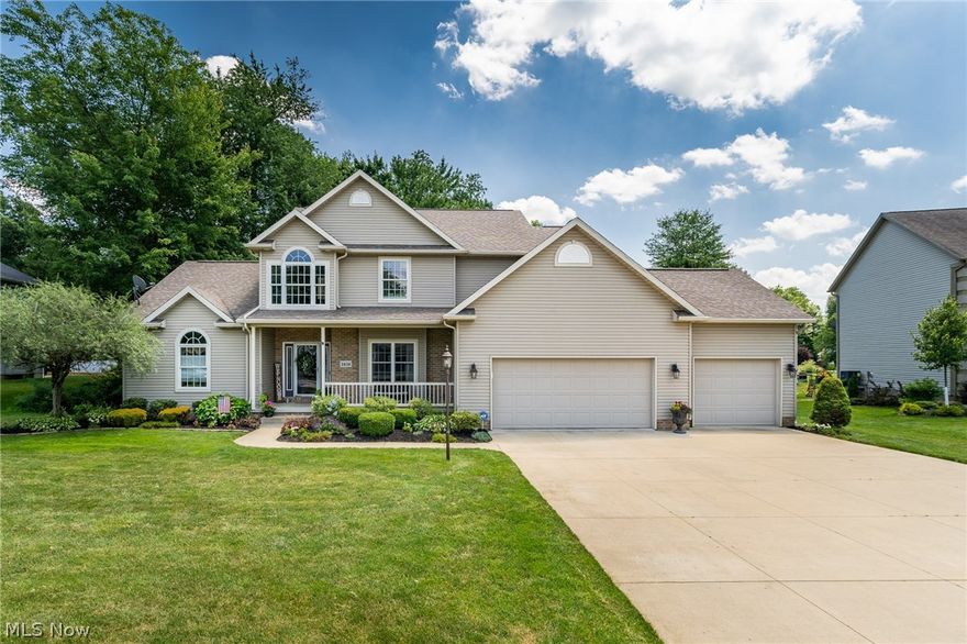 Don't miss this gorgeous colonial in Mystic Pointe with well manicured curb appeal. Walk-in to a two story foyer and into the great room with vaulted ceilings, a gas fireplace and lots of natural light from large windows and skylights. The open floor plan leads you into the eat-in kitchen with white cabinetry, stainless steel appliances, solid surface countertops and an island with with extra seating. Pantry is great for storage and a built in desk is the perfect place to get your work done. Spacious dining room is great for entertaining. First floor pampering master suite with vaulted ceilings, walk-in closet and large master bath include a double vanity, jacuzzi tub and glass walk-in shower. First floor laundry. Sun room off the kitchen is the perfect spot to enjoy your morning coffee or wind down in the evening. Sliding doors lead to large deck overlooking your private tree lined backyard. Spacious 3 bedrooms upstairs, one with a walk-in closet. Three car garage. To top things off t