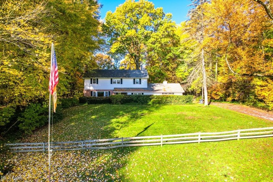 This beautiful 2 story is situated on 2 acres of land. The home exudes warmth & elegance, featuring a form liv rm w/masonry frpl/gas logs & form din rm w/cherry hdwd flrs & a built-in credenza. Plenty of windows flooding the space w/nat light creating 
a sense of spaciousness. In the center of the home is the remodeled kitchen well-appointed w/newer apps, cherry cab/soft close, built-in pantries, granite, & bamboo hdwd flooring. The fam rm w/a wd burning stove creating ideal space for family gatherings/entertaining & provides access to the 24 x 8 three-season room. Master ste & additional 3 bdrms and full bath provide ample accommodation for your family. Plenty of closet space throughout plus 2 large hall closets upstairs. The fourth bedroom has been converted and is currently being used as a convenient 2nd floor laundry room. Bsmt w/walk up stairs to side/backyard. Fence enclosure for furry or feathered friends. Embrace the serenity of rural living while still being close to city amenities. Updates include: Kit ’19, windows ’17 – ’19, roof ’14, plumb/hot H2O heat ‘22. Subject to lot split / approx. 2 acres in process along with a recorded easement for access thru driveway . Property can be sold with 1189 Sandy Lake Rd. MLS4506920.