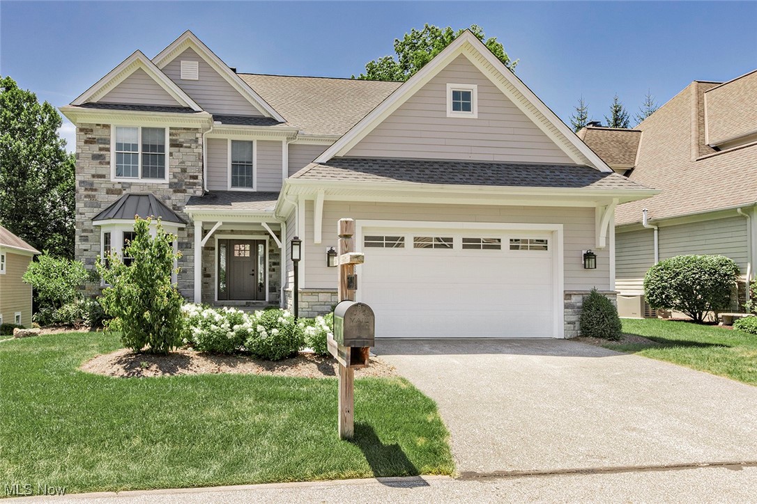 One of the first resales in Canyon Manor, a quiet enclave developed by Dino Palmieri. This is a custom built home with highest quality finishes. Hardwood floors throughout the first floor, built-ins in den/office and living room; coffered ceiling in living room and owners' suite. The living room/great room has a stone fireplace surrounded by built-ins. The open kitchen is a chef's dream with the finest appliances including a Subzero Refrigerator and Wolf oven/range (two ovens and microwave), granite countertops and a unique, gorgeous backsplash. The dining area opens to a relaxing sun porch overlooking the serene, wooded setting. The second floor features two equal sized bedrooms, both with walk-in closets. The bedrooms share a full bath. The lower level is phenomenal, complete with an exercise room, a theatre/rec room (with wet bar, wine refrigerator and built-ins), a beautiful office with a fireplace, and a powder room. The home also features a whole house generator. This is quite a gem.