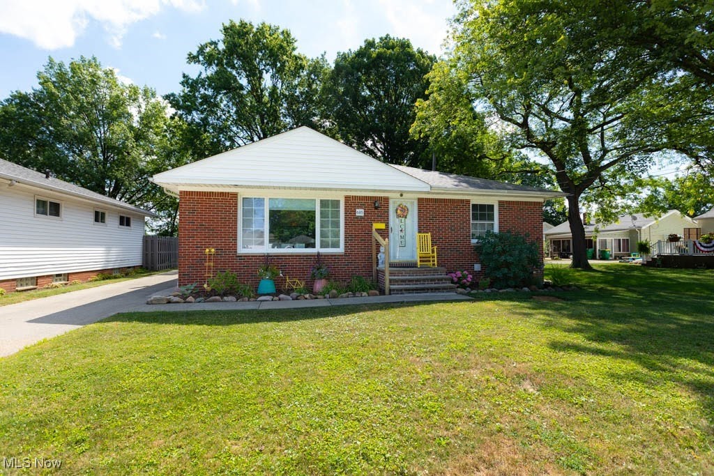 Embrace lifestyle of comfort and convenience in this wonderful all brick ranch home that is ideally located with Mary Park in the property's backdrop. The fabulous main level greets you with warm hardwood floors throughout leading to 2 inviting bedrooms and a modernized full bath, family room. Down the hallway we go through the spacious dining room flowing seamlessly into the modern kitchen that is where many culinary adventures await featuring granite countertops, white cabinetry, and newer Maytag appliances. Come outside through the sliding glass door onto the newly refinished large deck where the park like setting merges with the tranquility of the park itself. The partially finished basement offers flexible living boasting a rec room that can also offer capability of a 3rd bedroom. Also in the lower level another full bath and a neat and clean utility room/laundry room with storage. This home isn't just a house, it's an opportunity to enjoy peaceful living with close access to freeway and a park in your backyard. Make it yours today!