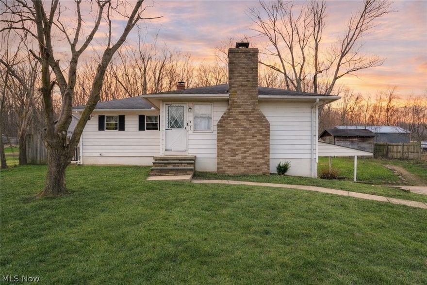 Located in Liverpool Township is this charming 3-bedroom, 1-bath home that offers 1,304 square feet of living space.
Homes in this area rarely come on the market due to the quiet setting and the many features the location has to offer.
Situated on nearly an acre of land, the property is surrounded by mature trees, numerous fruit trees and bushes. If you
are looking for a peaceful, country-like setting, this home delivers. Instead of neighbors, your front window looks out
over open cornfields. Inside, the home features a spacious living room with a wood fireplace and a partially open-concept layout that connects nicely to the rest of the living space. Just off the kitchen, you'll find a side door leading to the backyard as well
as stairs that take you down to the lower level. The main floor has been nicely updated with LVT flooring, and an
updated full bathroom. The lower level includes a partially finished basement with plumbing already in place for a potential second bathroom. This space is ideal for car enthusiasts or mechanics looking to create a unique workshop or man cave. The basement
also connects directly to the two-car garage, which features separate bays. Outside, the property includes an additional shed that’s perfect for providing extra storage space.