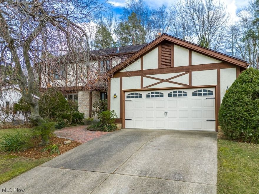 Like New & One Owner! Meticulously renovated in 2023-2024, 3 Bed/2.5 Bath w/newer LVT floors, fixtures, & fresh neutral paint. Step inside to newer Andersen windows, open floor plan, newer LVT flooring in the entry, family room, dining room, kitchen, & all bathrooms, while newer plush carpeting graces all bedrooms and stairs. The main level features a bright and updated kitchen, with Quartz Countertops, white cabinets for ample storage, Subway Tile Backsplash, space for a coffee bar, & Stainless appliances, including fridge, range, DW & microwave. Right off the kitchen is a Family Room with stone fireplace, wood beamed coffered ceiling & French door leading to the brick paver patio. Completing the 1st floor is a formal Dining Room & a powder room w/newer vanity, toilet, and fixtures. The 2nd floor boasts 3 bedrooms, including a spacious Master Suite complete w/Fireplace, huge Walk-In Closet, & en-suite bath featuring a dual sink vanity & soaking tub/shower combo. Additionally, a full bathroom with a separate sink area serves the remaining two spacious bedrooms that have double closets for tons of storage space. The full unfinished freshly painted basement includes a W/D and a newly installed H2O tank. Additional highlights include newer shake siding and entry door with sidelight, 2-car attached garage with man door, fully-fenced backyard, and a brick walkway with a special 1976 Bicentennial brick to mark the year this beautiful home was built. Conveniently located nearby are CVCA & Walsh Jesuit, Cleveland Clinic, Hike & Bike Trail, as well as cultural attractions like Blossom & the Cuyahoga Valley National Park. RT 8 is also easily accessible. An optional membership to the Wyoga Lake Estates Homeowners Assoc grants access to a private lake for swimming, kayaking, & fishing, playground, volleyball/basketball courts, outdoor pavilion, & social events. Move Right In! Don't miss this opportunity to make this updated beauty your new Home Sweet Home!