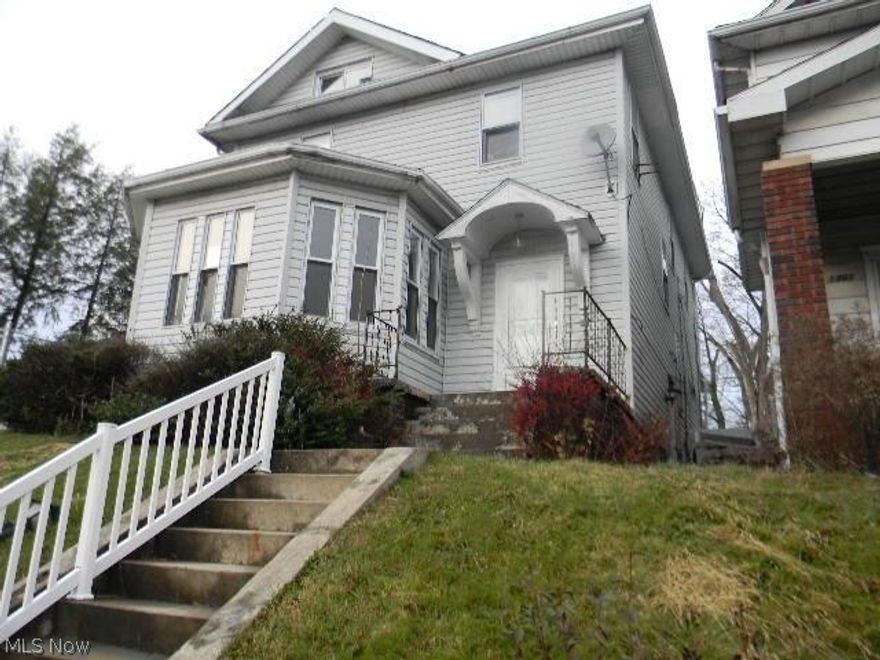 Price reduced!!!Charming, spacious home in need of TLC.  Lovely oak cabinets in kitchen, chandelier in dining room.  Previously a rec room in basement - walls have been removed. Now only 7.5k!!!!