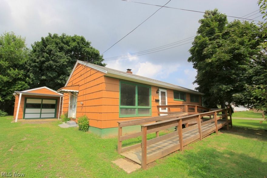 Great opportunity! Solid 3 BR bungalow with 1 car garage - Bones are very good on this just need your decorating - Extra lot with potential for other buildings (subject to buyers due diligence of Massillon Building rules) -