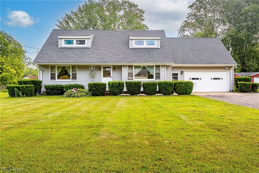 This lovely Elyria Twp home is just waiting for the next owner to continue making incredible memories here! Located right down the street from Rowland Nature Preserve where you can enjoy the walking trails, picnic area, playground and fishing in the pond! Across the street from Rowlands is Koinonia Lake, a private membership provides you access to swimming, fishing and camping.  Don't let the exterior of the home fool you! If space is what you need – look no further! No problem accommodating gatherings here!***4 Bedrooms – 2 down and 2 up – the upstairs bedrooms are huge!***Dual closet in master bedroom***Walk-in attic storage***3 Full bathrooms – 2 on the main floor and one upstairs***Hardwood floors under the carpeting on the first floor and second floors***Two living areas –well sized living room and family room with gas fireplace***Large eat in kitchen-abundant cherry finish cabinets with pull out shelving***Breakfast bar off eat-in area of kitchen flows into family room***1st floo