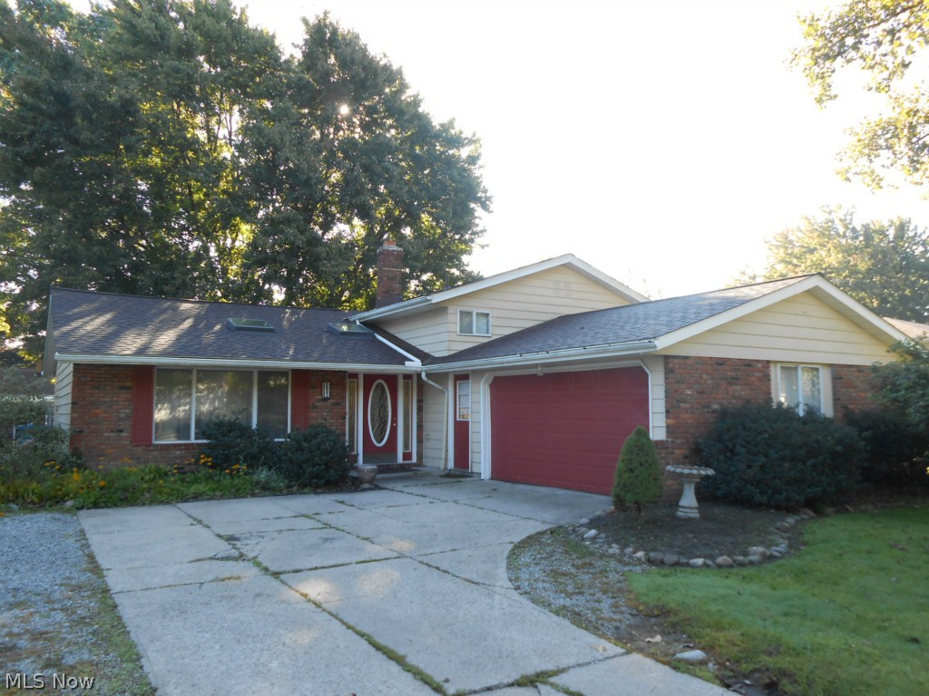 Desired location!! 2100+ sqft Split Level with fenced yard and patio. Vaulted ceiling in the formal living and dining rooms, stone wood burning fireplace in the family room. All appliances stay. Eat in kitchen has been updated, custom floor. Den/office can be 4th bedroom if needed. Some fresh painting has been done along with newer carpet. Roof and skylights replaced 2013. H2Otank 2012. Seller is motived. This is priced competitively well. Needs your special decorating touches.