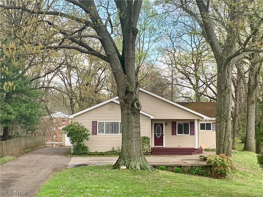 Beautiful Ranch Home with a 4 car detached garage!!!  This home is larger than it looks! 3 Bedrooms, 2 full baths, large 17x18 great room with gas fireplace.
All new neutral carpet throughout!  Spacious. Eat in kitchen, convenient laundry area.  Master Bedroom features a large walk in closet & private bath with whirlpool tub. This property includes 2 - two stall detached garages