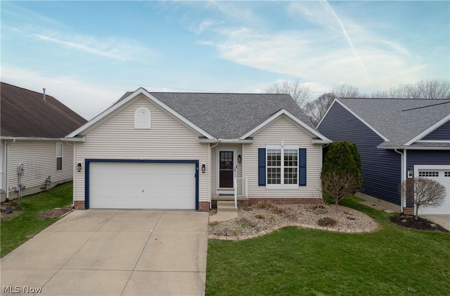 Become the third ever owner of this meticulously maintained 2 bedroom, 2 full bathroom ranch in Coventry Crossing. If you like open, flexible spaces with your floor plan then you will love this home. The front door opens to an entryway with new luxury vinyl plank flooring that extends to the back of the home, a large living room with vaulted ceilings and a flex space used by the first owners as a dining room, or use an office space. Walking into the remodeled kitchen, you will find new granite countertops, new fridge, new oven and new microwave plus a breakfast bar island that opens up into more flexible space for you to personalize. There's room for a large dinner table, or a smaller eat in kitchen plus second sitting room with sliding door that leads onto the back patio. Both bedrooms have their own full bathroom and excellent closet space. The owner's bathroom has a walk-in closet as well. Other updates include both a new roof (2024) and water heater (2020), the GOOD blinds, fresh paint, bathroom tile floor and a new shed. The large unfinished basement is well insulated should you choose to finish it, or leave as is for storage and the workshop for hobbyists. Outside once the leaves are back on the trees, you'll be looking at green from your back porch with or without the extendable awning above you. The 2 car garage, main level washer and dryer that stay with the home plus easy access to amenities and freeways round out this homes' very practical features. Come schedule a showing before this is gone and don't forget to walk to Coventry Crossing's own playground.