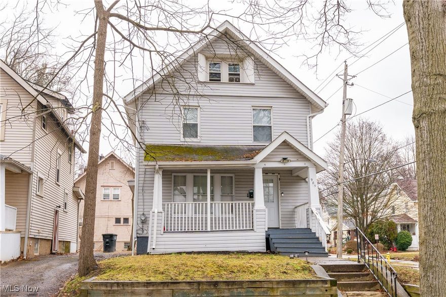 This Highland Square Colonial offers timeless appeal with natural woodwork, built-in shelving, and a cozy fireplace that anchors the living room. A welcoming front porch provides a comfortable place to enjoy the outdoors throughout the seasons.

The dining room continues the character with additional built-ins, creating a functional space for everyday meals or gatherings. The kitchen features light cabinetry and ample counter space with a practical layout that connects easily to the main living areas.

Three nicely sized bedrooms are located on the second floor, while the expansive attic level provides a large bonus space ideal for a primary bedroom, home office, or additional living area. Electrical and plumbing improvements and mechanical updates add peace of mind, while the layout offers flexibility to fit a variety of lifestyles.

With its original details, versatile layout, and desirable Highland Square location, this home delivers character and space ready to be enjoyed.